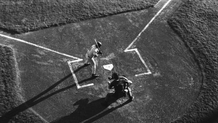 An overhead view of a batter in the batter's box ready to hit in Northwest League action. The Vancouver Canadians, the A affiliate of the Oakland Athletics, are the lowest rung on the path to the big show. The players here play out their dreams of a shot at Major League stardom. (Photo by Christopher Morris/Corbis via Getty Images)