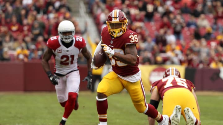 LANDOVER, MD - DECEMBER 17: Running Back Kapri Bibbs #39 of the Washington Redskins rushes for a touchdown in the second quarter against the Arizona Cardinals at FedEx Field on December 17, 2017 in Landover, Maryland. (Photo by Patrick Smith/Getty Images)