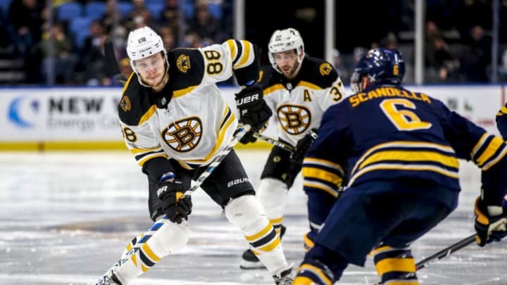 BUFFALO, NY - December 19: Boston Bruins right wing David Pastrnak (88) shoots in on goal during an NHL game between the Boston Bruins and Buffalo Sabres on December 19, 2017, at KeyBank Center in Buffalo, NY. (Jerome Davis/Icon Sportswire via Getty Images)