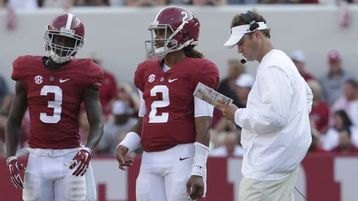 Sep 10, 2016; Tuscaloosa, AL, USA; Alabama Crimson Tide offensive coordinator Lane Kiffin talks with quarterback Jalen Hurts (2) and wide receiver Calvin Ridley (3) during the game against Western Kentucky Hilltoppers at Bryant-Denny Stadium. The Tide defeated the Hilltoppers 38-10. Mandatory Credit: Marvin Gentry-USA TODAY Sports