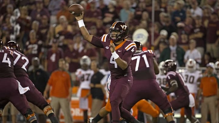 Oct 20, 2016; Blacksburg, VA, USA; Virginia Tech Hokies quarterback Jerod Evans (4) throws a pass during the first quarter against the Miami Hurricanes at Lane Stadium. Mandatory Credit: Peter Casey-USA TODAY Sports