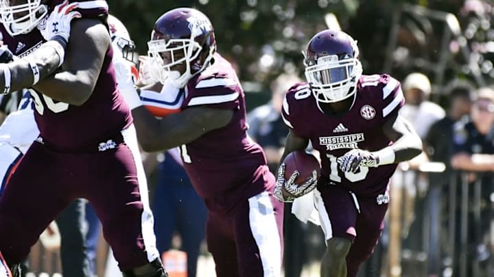 Oct 8, 2016; Starkville, MS, USA; Mississippi State Bulldogs running back Brandon Holloway (10) runs the ball during the third quarter of the game against the Auburn Tigers at Davis Wade Stadium. Auburn won 38-14. Mandatory Credit: Matt Bush-USA TODAY Sports