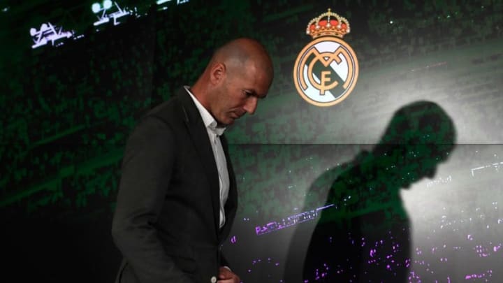 TOPSHOT - Real Madrid´s newly appointed French coach Zinedine Zidane arrives to give a press conference on March 11, 2019 in Madrid. - Zinedine Zidane has made a sensational return as coach of Real Madrid after Santiago Solari's sacking was finally confirmed. Zidane has been given a contract until June 2022, just nine months after he resigned at the end of last season, having led Madrid to an historic third consecutive Champions League triumph. (Photo by PIERRE-PHILIPPE MARCOU / AFP) (Photo credit should read PIERRE-PHILIPPE MARCOU/AFP/Getty Images)