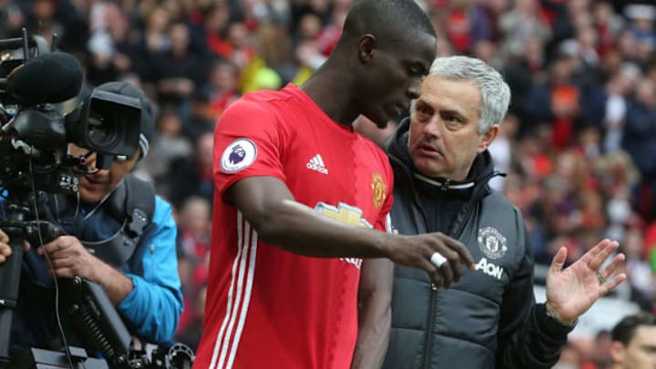 MANCHESTER, ENGLAND – APRIL 16: Manager Jose Mourinho of Manchester United speaks to Eric Bailly ahead of the second half during the Premier League match between Manchester United and Chelsea at Old Trafford on April 16, 2017 in Manchester, England. (Photo by Matthew Peters/Man Utd via Getty Images)