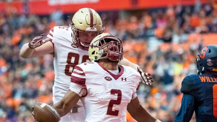 SYRACUSE, NY - NOVEMBER 25: AJ Dillon #2 of the Boston College Eagles celebrates a touchdown during the first quarter that makes the score 14-7 Boston College leading Syracuse Orange at the Carrier Dome on November 25, 2017 in Syracuse, New York. (Photo by Brett Carlsen/Getty Images)