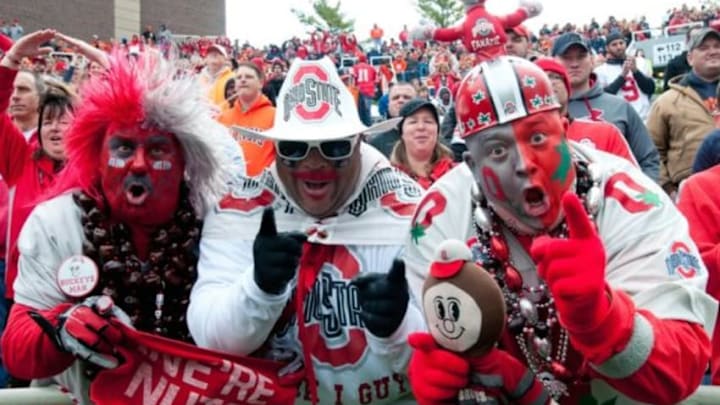 Nov 16, 2013; Champaign, IL, USA; Ohio State Buckeyes fans during the first quarter against the Illinois Fighting Illini at Memorial Stadium. Mandatory Credit: Bradley Leeb-USA TODAY Sports