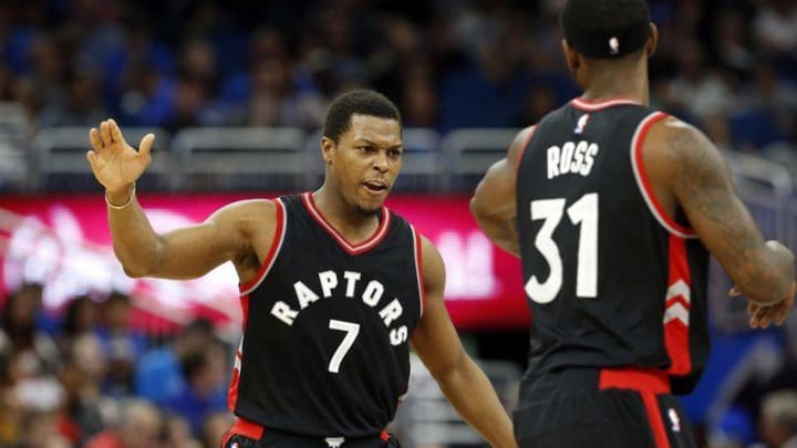 Dec 18, 2016; Orlando, FL, USA; Toronto Raptors guard Kyle Lowry (7) and forward Terrence Ross (31) high five each other during the second half against the Orlando Magic at Amway Center. Toronto Raptors defeated the Orlando Magic 109-79. Mandatory Credit: Kim Klement-USA TODAY Sports