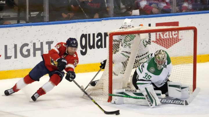 Jan 14, 2022; Sunrise, Florida, USA; Florida Panthers center Sam Bennett (9) shoots the on Dallas Stars goaltender Anton Khudobin (35) during the second period at FLA Live Arena. Mandatory Credit: Jasen Vinlove-USA TODAY Sports