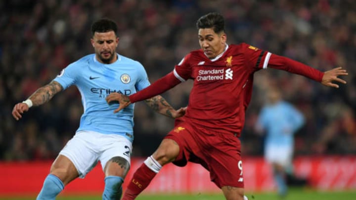 LIVERPOOL, ENGLAND – JANUARY 14: Kyle Walker of Manchester City and Roberto Firmino of Liverpool battles for possesion during the Premier League match between Liverpool and Manchester City at Anfield on January 14, 2018 in Liverpool, England. (Photo by Shaun Botterill/Getty Images)