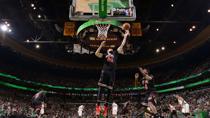 BOSTON, MA - APRIL 16: Nikola Mirotic #44 of the Chicago Bulls grabs the rebound; against the Boston Celtics during the Eastern Conference Quarter-finals of the 2017 NBA Playoffs on April 16, 2017 at TD Garden in Boston, MA. NOTE TO USER: User expressly acknowledges and agrees that, by downloading and or using this Photograph, user is consenting to the terms and conditions of the Getty Images License Agreement. Mandatory Copyright Notice: Copyright 2017 NBAE (Photo by Brian Babineau/NBAE via Getty Images)