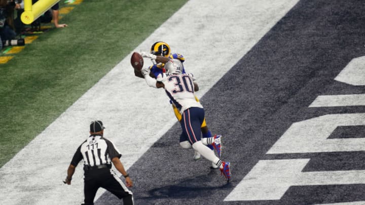 ATLANTA, GEORGIA - FEBRUARY 03: Jason McCourty #30 of the New England Patriots breaks up a pass to Brandin Cooks #12 of the Los Angeles Rams during Super Bowl LIII at Mercedes-Benz Stadium on February 03, 2019 in Atlanta, Georgia. (Photo by Michael Zagaris/Getty Images)