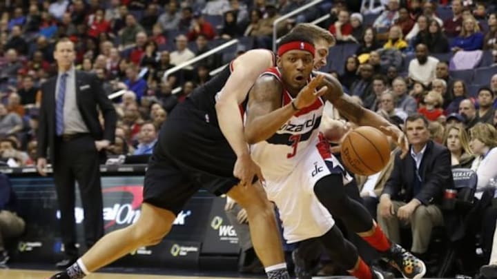Jan 18, 2016; Washington, DC, USA; Washington Wizards guard Bradley Beal (3) dribbles the ball past Portland Trail Blazers forward Meyers Leonard (11) in the third quarter at Verizon Center. The Blazers won 108-98. Mandatory Credit: Geoff Burke-USA TODAY Sports