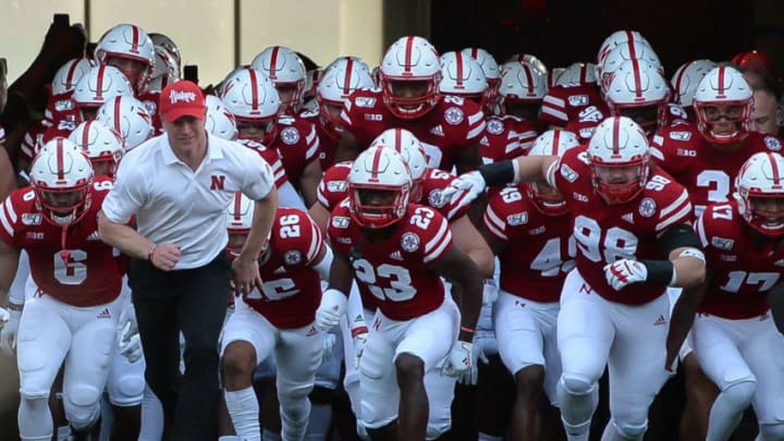LINCOLN, NE - SEPTEMBER 14: Head coach Scott Frost of the Nebraska Cornhuskers leads the team on the field against the Northern Illinois Huskies at Memorial Stadium on September 14, 2019 in Lincoln, Nebraska. (Photo by Steven Branscombe/Getty Images)