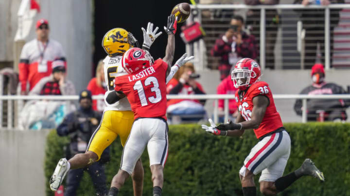 Nov 6, 2021; Athens, Georgia, USA; Georgia Bulldogs defensive back Kamari Lassiter (13) breaks up a pass against Missouri Tigers wide receiver Keke Chism (6) during the second half at Sanford Stadium. Mandatory Credit: Dale Zanine-USA TODAY Sports