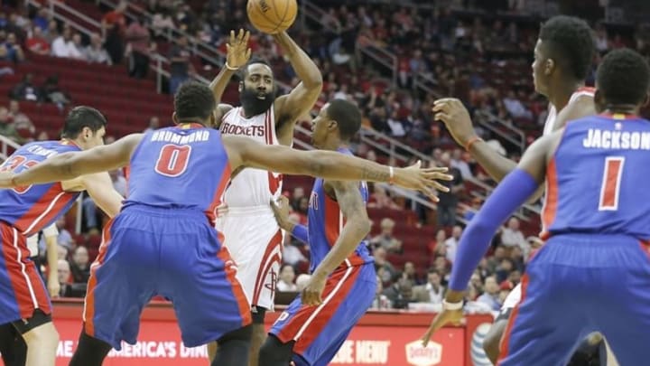 Jan 20, 2016; Houston, TX, USA; Houston Rockets guard James Harden (13) looks to pass against Detroit Pistons center Andre Drummond (0) in the first quarter at Toyota Center. Mandatory Credit: Thomas B. Shea-USA TODAY Sports