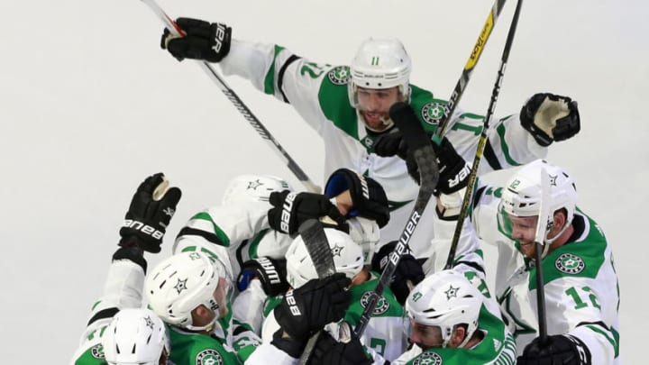 EDMONTON, ALBERTA - AUGUST 16: John Klingberg #3 of the Dallas Stars celebrates with his teammates (Photo by Jeff Vinnick/Getty Images)