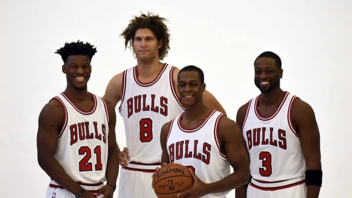 Sep 26, 2016; Chicago, IL, USA; Chicago Bulls guard Jimmy Butler (21) center Robin Lopez (8) guard Rajon Rondo (9) and guard Dwayne Wade (3) pose for a photo during Bulls media day at The Advocate Center. Mandatory Credit: David Banks-USA TODAY Sports