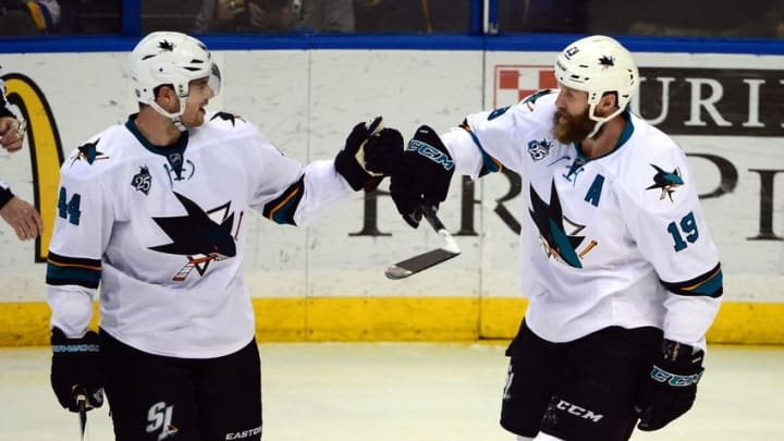 Feb 22, 2016; St. Louis, MO, USA; San Jose Sharks center Joe Thornton (19) is congratulated by defenseman Marc-Edouard Vlasic (44) after scoring a goal against the St. Louis Blues during the third period at Scottrade Center. The Sharks defeated the Blues 6-3. Mandatory Credit: Jeff Curry-USA TODAY Sports