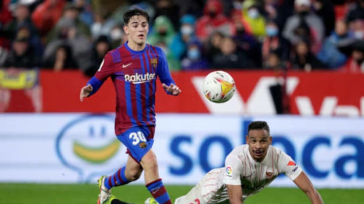 Gavi (left) is among the three latest Barcelona players to test positive for Covid-19. (Photo by David S. Bustamante/Soccrates/Getty Images)