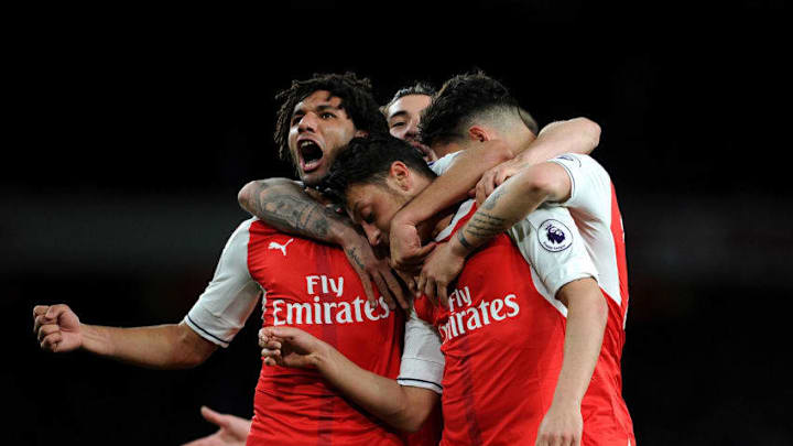 LONDON, ENGLAND - APRIL 05: Arsenal's Mesut Ozil celebrates scoring a goal for Arsenal with Mohamed Elneny during the Premier League match between Arsenal and West Ham United at Emirates Stadium on April 5, 2017 in London, England. (Photo by David Price/Arsenal FC via Getty Images)