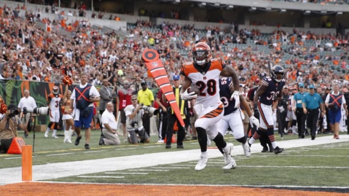 NFL DFS Bargain Bin: CINCINNATI, OH - AUGUST 09: Joe Mixon #28 of the Cincinnati Bengals runs into the end zone for a 24-yard touchdown reception in the first quarter of a preseason game against the Chicago Bears at Paul Brown Stadium on August 9, 2018 in Cincinnati, Ohio. (Photo by Joe Robbins/Getty Images)