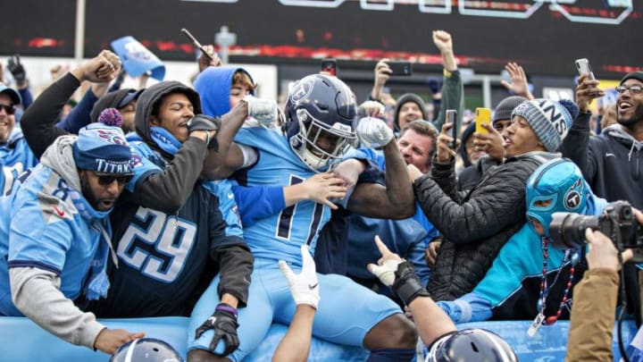 NASHVILLE, TN - DECEMBER 15: A.J. Brown #11 of the Tennessee Titans celebrates with fans after catching a touchdown pass during a game against the Houston Texans at Nissan Stadium on December 15, 2019 in Nashville, Tennessee. The Texans defeated the Titans 24-21. (Photo by Wesley Hitt/Getty Images)