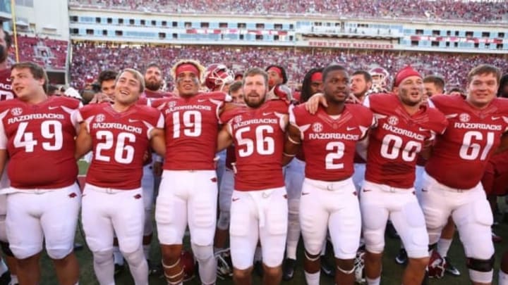 Sep 3, 2016; Fayetteville, AR, USA; Arkansas Razorbacks celebrate after the game against the Louisiana Tech Bulldogs at Donald W. Reynolds Razorback Stadium. Arkansas defeated Louisiana Tech 21-20. Mandatory Credit: Nelson Chenault-USA TODAY Sports