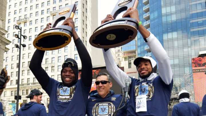PHILADELPHIA, PA - APRIL 05: Dhamir Cosby-Roundtree, Jay Wright and Mikal Bridges of the Villanova Wildcats celebrate after the Championship Parade on April 5, 2018 in Philadelphia, Pennsylvania. (Photo by Drew Hallowell/Getty Images)