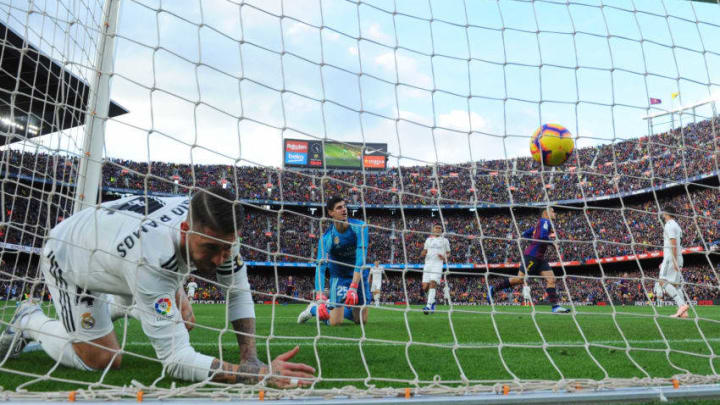 BARCELONA, SPAIN - OCTOBER 28: Sergio Ramos and Thibaut Courtois of Real Madrid react as Philippe Coutinho of Barcelona scores his sides first goal during the La Liga match between FC Barcelona and Real Madrid CF at Camp Nou on October 28, 2018 in Barcelona, Spain. (Photo by Alex Caparros/Getty Images)