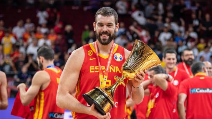 BEIJING, CHINA - SEPTEMBER 15: Marc Gasol of Spain celebrates their victory with the trophy at the cup ceremony after winning the FIBA World Cup 2019 match against the Argentina National Team at Beijing Wukesong Sport Arena on September 15, 2019 in Beijing, China. (Photo by Stringer/Anadolu Agency via Getty Images)
