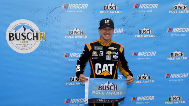 KANSAS CITY, KANSAS - OCTOBER 19: Daniel Hemric, driver of the #8 Caterpillar Chevrolet, poses with the pole award after qualifying for the Monster Energy NASCAR Cup Series Hollywood Casino 400 at Kansas Speedway on October 19, 2019 in Kansas City, Kansas. (Photo by Jonathan Ferrey/Getty Images)