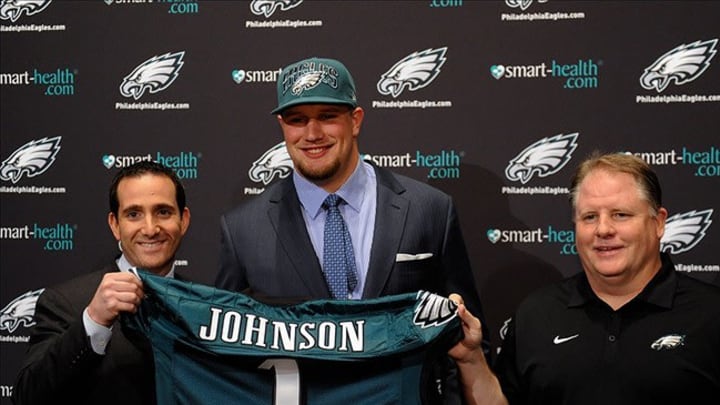 Apr 26, 2013; Philadelphia, PA, USA; Philadelphia Eagles general manager Howie Roseman offensive tackle Lane Johnsonwith (Oklahoma) the fourth overall pick of the 2013 NFL Draft and head coach Chip Kelly pose for a photo during a press conference at the NovaCare Complex. Mandatory Credit: Howard Smith-USA TODAY Sports