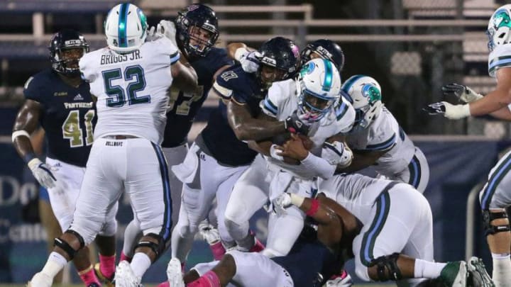 MIAMI, FL - OCTOBER 14: Tulane Green Wave (Photo by Joel Auerbach/Getty Images)