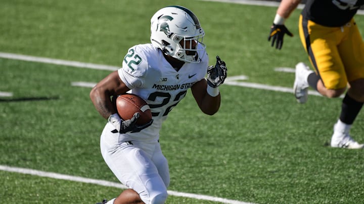 Nov 7, 2020; Iowa City, Iowa, USA; Michigan State Spartans running back Jordon Simmons (22) runs the ball against the Iowa Hawkeyes during the third quarter at Kinnick Stadium. Mandatory Credit: Jeffrey Becker-USA TODAY Sports