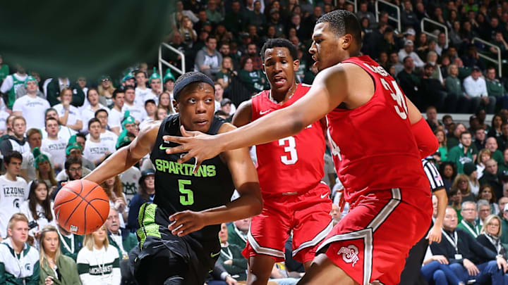 EAST LANSING, MI – FEBRUARY 17: Cassius Winston #5 of the Michigan State Spartans drives to the basket while defended by Kaleb Wesson #34 of the Ohio State Buckeyes in the first half at Breslin Center on February 17, 2019 in East Lansing, Michigan. (Photo by Rey Del Rio/Getty Images)