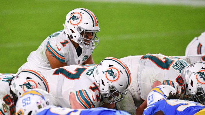 MIAMI GARDENS, FLORIDA - NOVEMBER 15: Tua Tagovailoa #1 of the Miami Dolphins prepares to snap the ball against the Los Angeles Chargers during the second half at Hard Rock Stadium on November 15, 2020 in Miami Gardens, Florida. (Photo by Mark Brown/Getty Images)