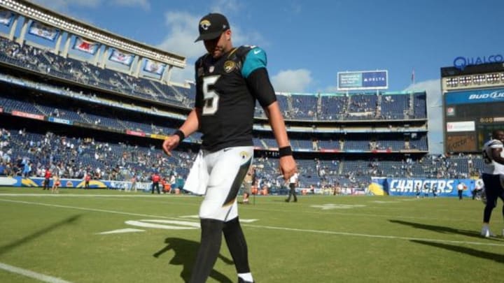 Jacksonville Jaguars quarterback Blake Bortles (5) walks off the field after the San Diego Chargers beat the Jaguars 33-14 at Qualcomm Stadium. Mandatory Credit: Jake Roth-USA TODAY Sports