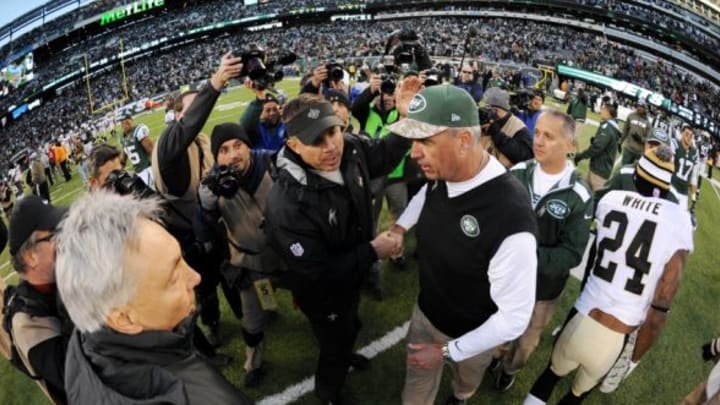 Nov 3, 2013; East Rutherford, NJ, USA; New York Jets head coach Rex Ryan and New Orleans Saints head coach Sean Payton shake hands after the second half at MetLife Stadium. The Jets won the game 26-20. Mandatory Credit: Joe Camporeale-USA TODAY Sports