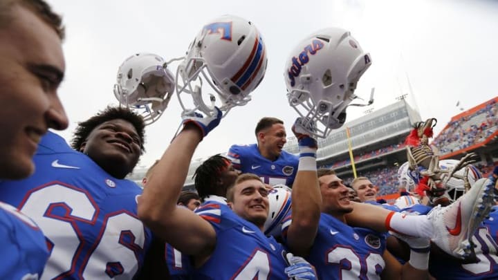 Nov 12, 2016; Gainesville, FL, USA; Florida Gators place kicker Eddy Pineiro (15) and teammates celebrate after defeating the South Carolina Gamecocks at Ben Hill Griffin Stadium. Florida Gators defeated the South Carolina Gamecocks 20-7. Mandatory Credit: Kim Klement-USA TODAY Sports