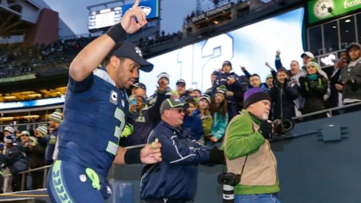 Dec 28, 2014; Seattle, WA, USA; Seattle Seahawks quarterback Russell Wilson (3) returns to the locker room following a 20-6 victory against the St. Louis Rams at CenturyLink Field. Mandatory Credit: Joe Nicholson-USA TODAY Sports Dec 28, 2014; Seattle, WA, USA; Seattle Seahawks quarterback Russell Wilson (3) returns to the locker room following a 20-6 victory against the St. Louis Rams at CenturyLink Field. Mandatory Credit: Joe Nicholson-USA TODAY Sports