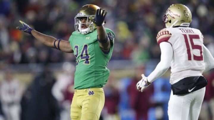 SOUTH BEND, IN - NOVEMBER 10: Nick Coleman #24 of the Notre Dame Fighting Irish celebrates after breaking up a pass against Tamorrion Terry #15 of the Florida State Seminoles in the first quarter of the game at Notre Dame Stadium on November 10, 2018 in South Bend, Indiana. (Photo by Joe Robbins/Getty Images)