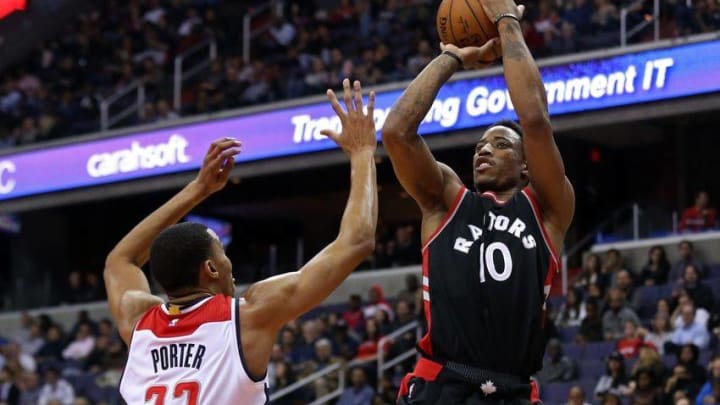 Nov 2, 2016; Washington, DC, USA; Toronto Raptors guard DeMar DeRozan (10) shoots the ball over Washington Wizards forward Otto Porter Jr. (22) in the second quarter at Verizon Center. The Raptors won 113-103. Mandatory Credit: Geoff Burke-USA TODAY Sports