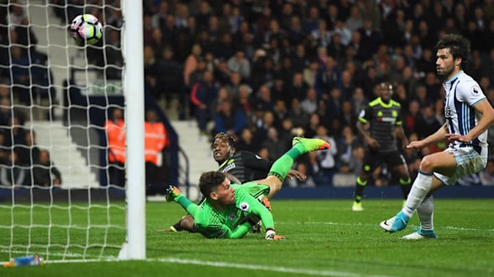 WEST BROMWICH, ENGLAND - MAY 12: Michy Batshuayi of Chelsea scores his sides first goal past Ben Foster of West Bromwich Albion during the Premier League match between West Bromwich Albion and Chelsea at The Hawthorns on May 12, 2017 in West Bromwich, England. (Photo by Laurence Griffiths/Getty Images)