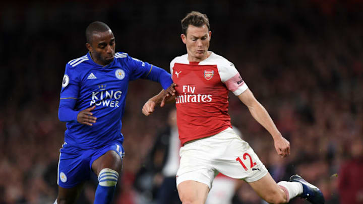 LONDON, ENGLAND - OCTOBER 22: Ricardo Pereira of Leicester City battles for possession with Stephan Lichtsteiner of Arsenal during the Premier League match between Arsenal FC and Leicester City at Emirates Stadium on October 22, 2018 in London, United Kingdom. (Photo by Shaun Botterill/Getty Images)