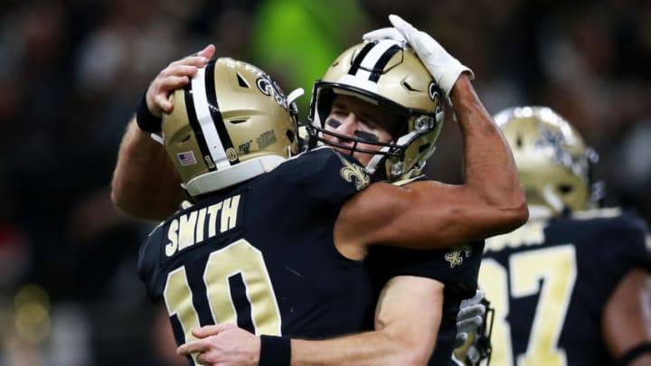 NEW ORLEANS, LOUISIANA - DECEMBER 16: Quarterback Drew Brees #9 of the New Orleans Saints and wide receiver Tre'Quan Smith #10 celebrate their touchdown in the second quarter of the game against the Indianapolis Colts at Mercedes Benz Superdome on December 16, 2019 in New Orleans, Louisiana. (Photo by Sean Gardner/Getty Images)