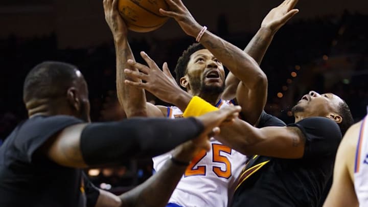 Oct 25, 2016; Cleveland, OH, USA; New York Knicks guard Derrick Rose (25) is fouled as he goes to the basket in the second half against the Cleveland Cavaliers at Quicken Loans Arena. Cleveland won 117-88. Mandatory Credit: Rick Osentoski-USA TODAY Sports