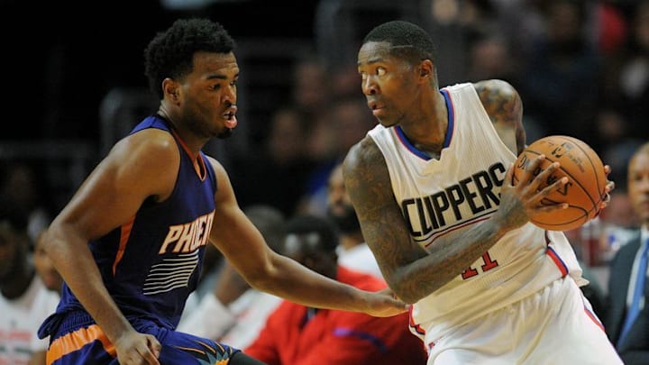 October 31, 2016; Los Angeles, CA, USA; Los Angeles Clippers guard Jamal Crawford (11) controls the ball against Phoenix Suns forward T.J. Warren (12) during the second half at Staples Center. Mandatory Credit: Gary A. Vasquez-USA TODAY Sports