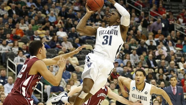 Mar 19, 2015; Pittsburgh, PA, USA; Villanova Wildcats guard Dylan Ennis (31) shoots the ball over Lafayette Leopards guard Monty Boykins (32) during the second half in the second round of the 2015 NCAA Tournament at Consol Energy Center. Mandatory Credit: Geoff Burke-USA TODAY Sports
