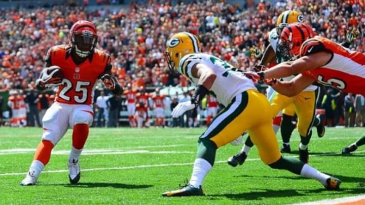 Sep 22, 2013; Cincinnati, OH, USA; Cincinnati Bengals running back Giovani Bernard (25) rushes for a touchdown during the first quarter against the Green Bay Packers at Paul Brown Stadium. Mandatory Credit: Andrew Weber-USA TODAY Sports