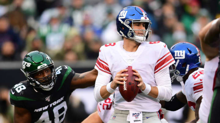 EAST RUTHERFORD, NEW JERSEY - NOVEMBER 10: Daniel Jones #8 of the New York Giants drops back to pass during the second half of their game against the New York Jets at MetLife Stadium on November 10, 2019 in East Rutherford, New Jersey. (Photo by Emilee Chinn/Getty Images)
